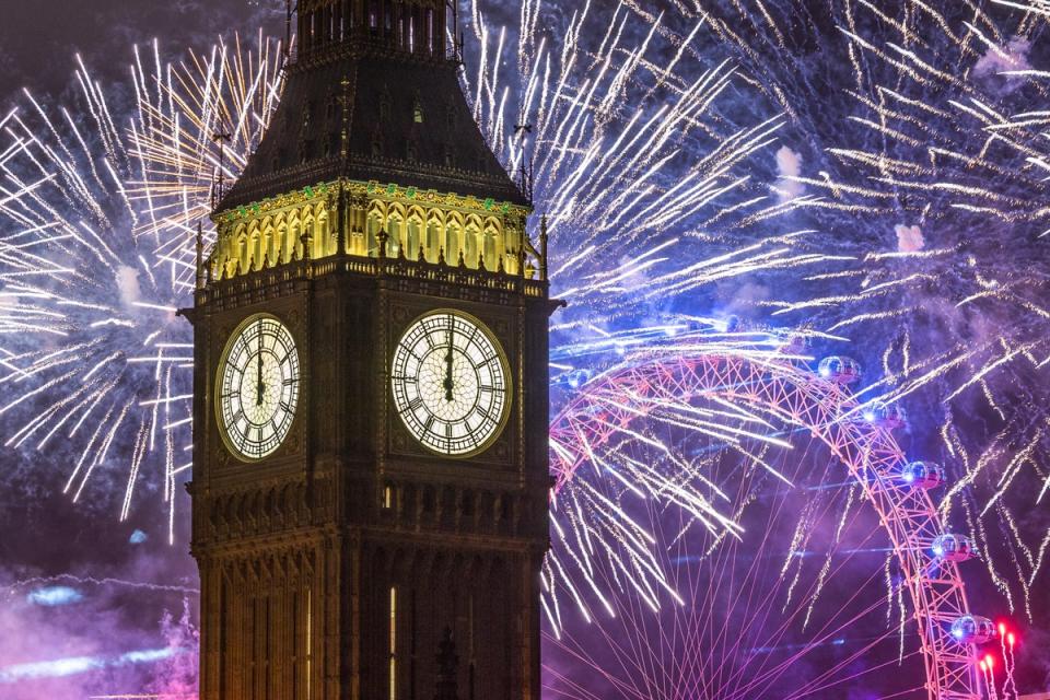 Fireworks light up the London skyline over Big Ben and the London Eye just after midnight (Getty Images)