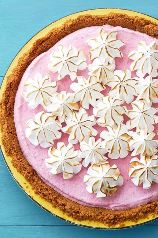 <p>Give everyone the fruity flavors of spring with this raspberry meringue pie, which is a delicious take on the traditional ice cream cake.</p><p>Get the <strong><a href="https://www.womansday.com/food-recipes/food-drinks/recipes/a58997/frozen-raspberry-meringue-pie-recipe/" rel="nofollow noopener" target="_blank" data-ylk="slk:Frozen Raspberry Meringue Pie recipe.;elm:context_link;itc:0;sec:content-canvas" class="link ">Frozen Raspberry Meringue Pie recipe.</a></strong></p>