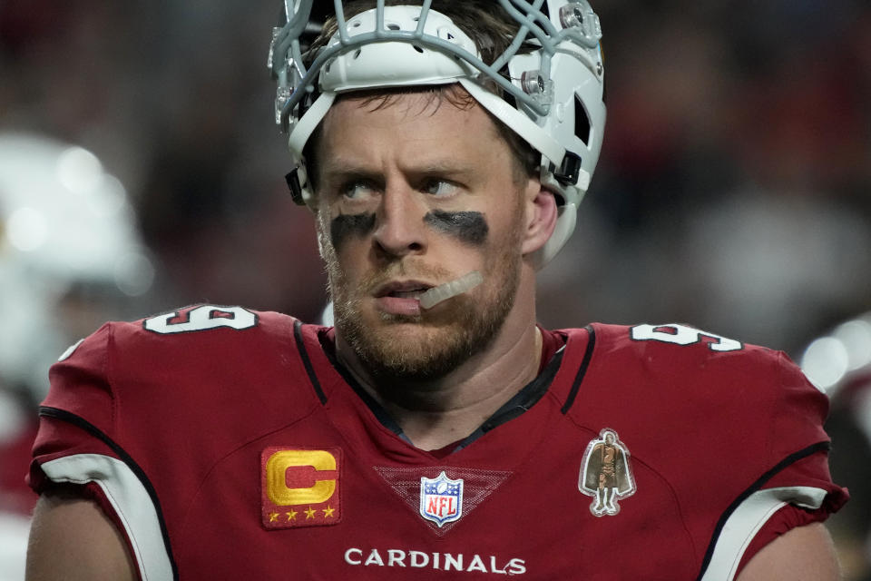 Arizona Cardinals defensive end J.J. Watt walks to his sideline during the first half of an NFL football game against the Tampa Bay Buccaneers, Sunday, Dec. 25, 2022, in Glendale, Ariz. (AP Photo/Rick Scuteri)