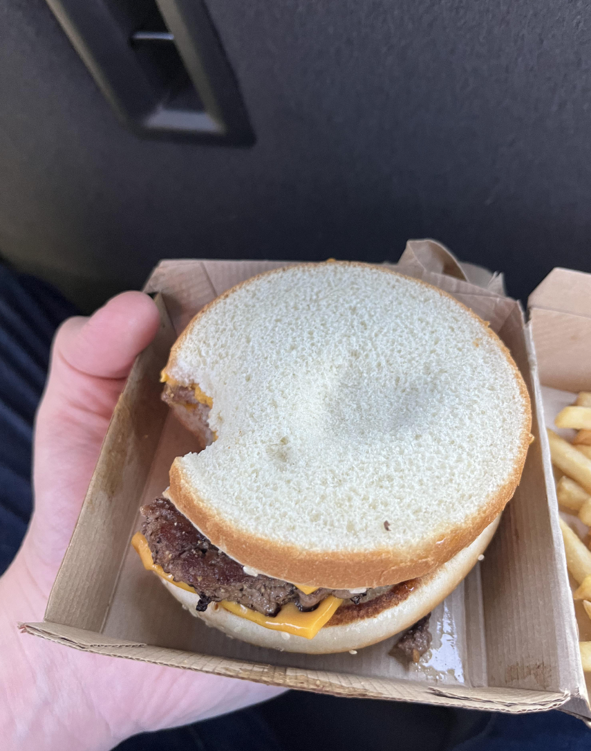A burger from McDonald's with weird buns