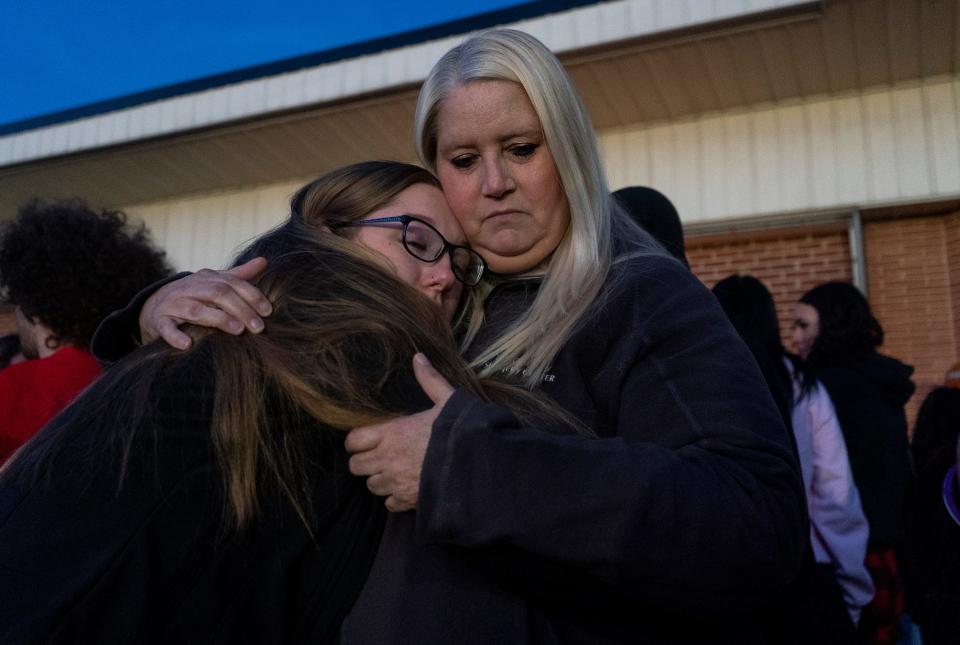 Krista Wiseley, from Bensalem, hugs her daughter, Isabella (17) during the vigil for Peter Romano, the 14 year-old who was fatally shot on Halloween, at 2636 Bristol Pike in Bensalem on Thursday, Nov. 2, 2023.

[Daniella Heminghaus | Bucks County Courier Times]