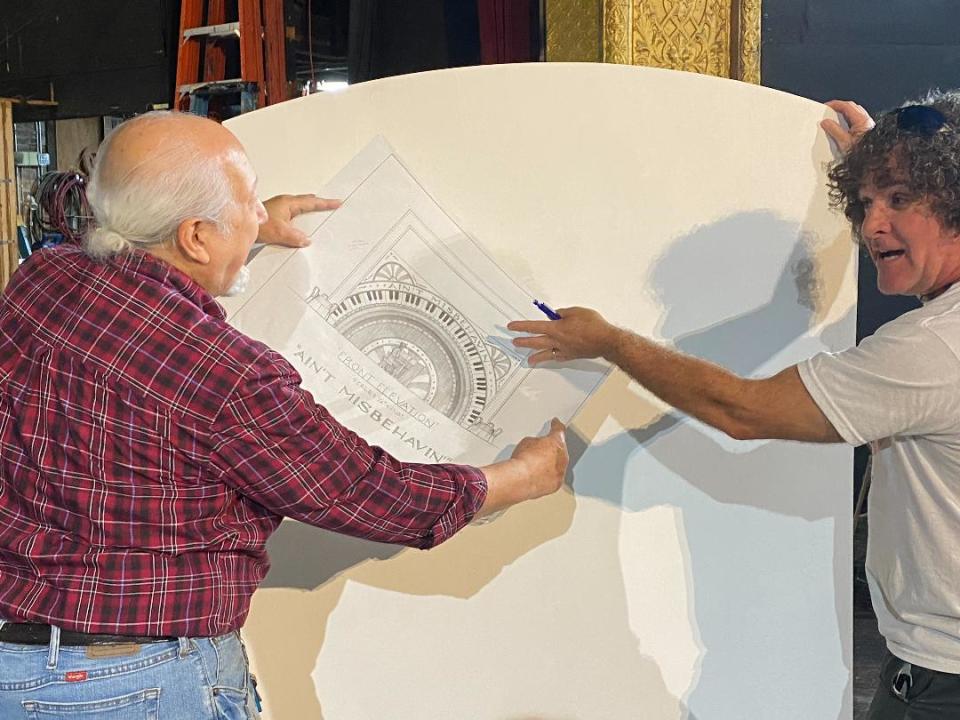 Artistic Director Carlos Francisco Asse, left, and board member Rick Breese discussing building the set from the blueprint for "Ain't Misbehavin by the Bay Street Players on stage Jan 20-30.