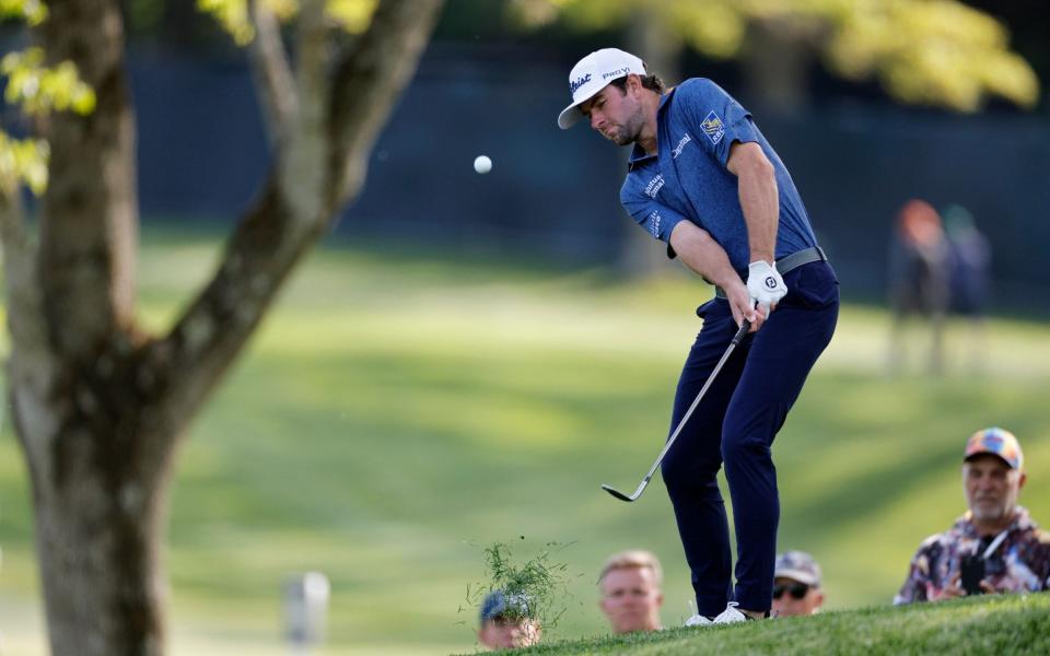 Cameron Young of the United States chips onto the seventh green during the first round of the 2023 PGA Championship golf tournament at the Oak Hill Country Club in Rochester, New York, USA, 18 May 2023 - Shutterstock/Erik S Lesser