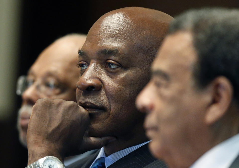 FILE - Harvard law professor Charles Ogletree Jr., center, takes part in a panel discussion during the National Association of Black Journalists convention in Boston on Aug. 1, 2014. The Merced County courthouse was named Friday, Feb. 17, 2023, for Ogletree Jr., who taught President Barack Obama and represented rapper Tupac Shakur, to honor for his contributions to law, education and civil rights. (AP Photo/Michael Dwyer, File)