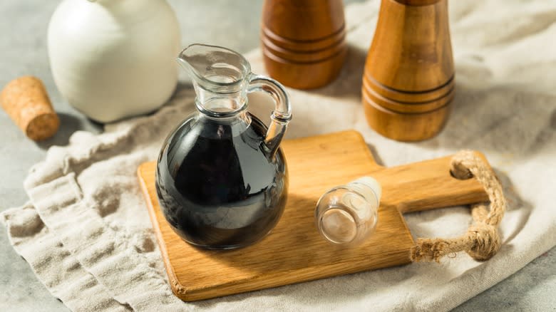 Glass jug of balsamic glaze