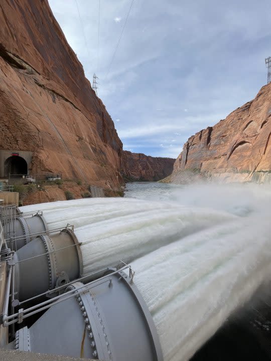 April 24, 2023 – Glen Canyon Dam High-Flow Release. The pipes shown are part of the river outlet Works. (U.S. Bureau of Reclamation)