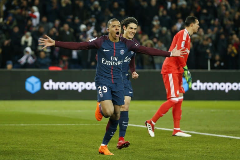 Kylian Mbappe celebrates becoming the youngest scorer in 'Le Classique'