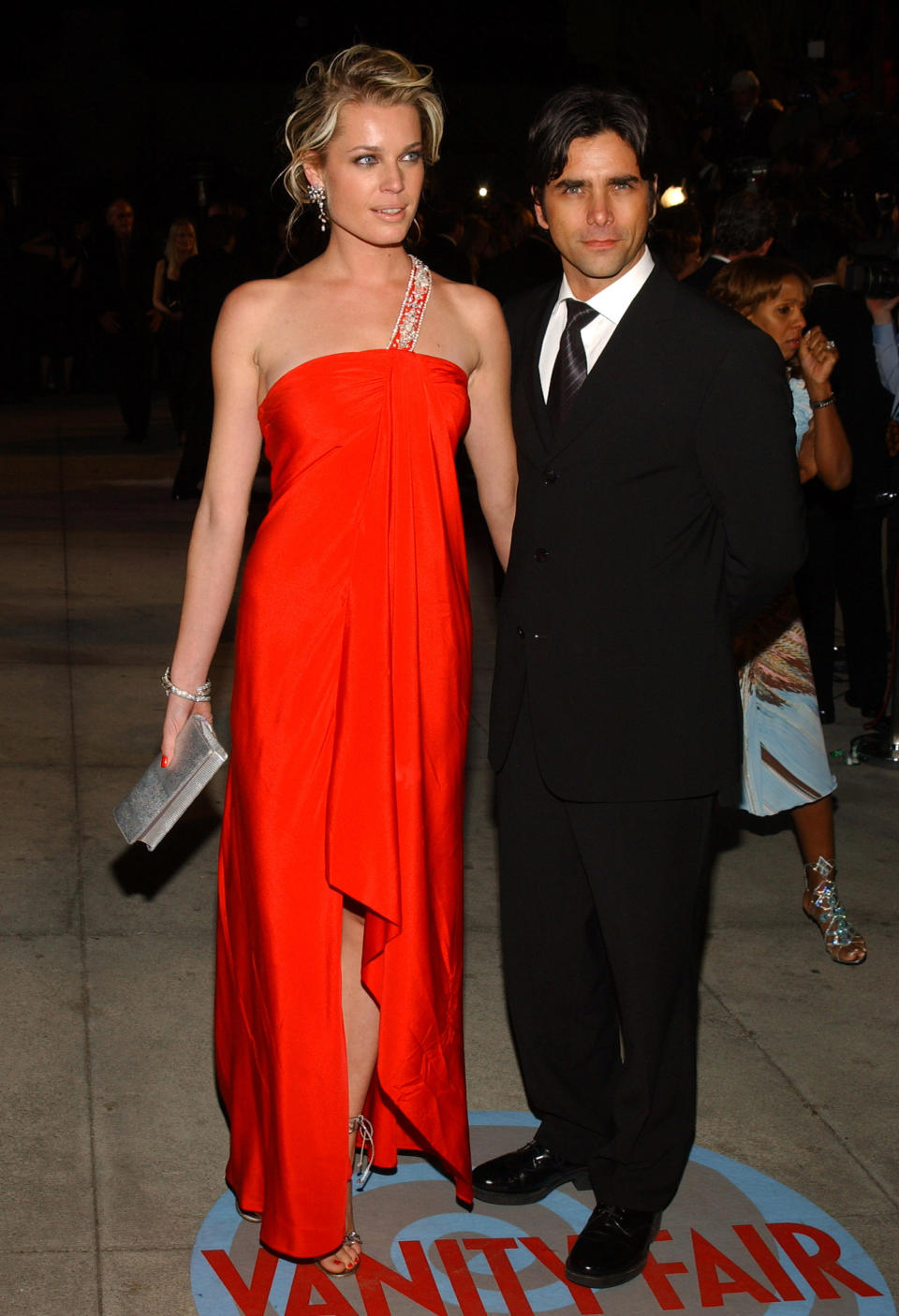 Rebecca Romijn and John Stamos in February 2004. (Photo: Getty Images)