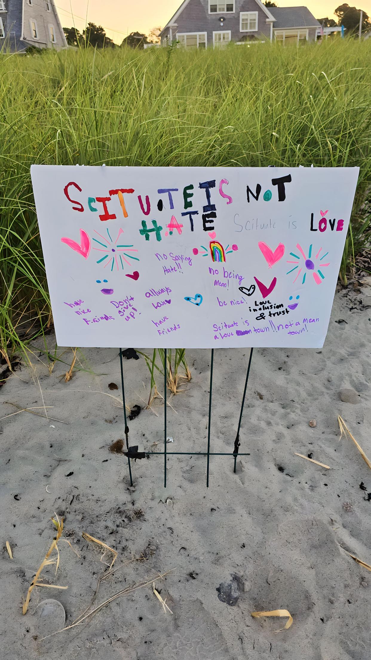 Scituate residents placed illuminated lanterns along the seashore in support of Scituate Public Schools Diversity, Equity and Inclusion Director jamele adams, who was the target of a hateful message in July.
