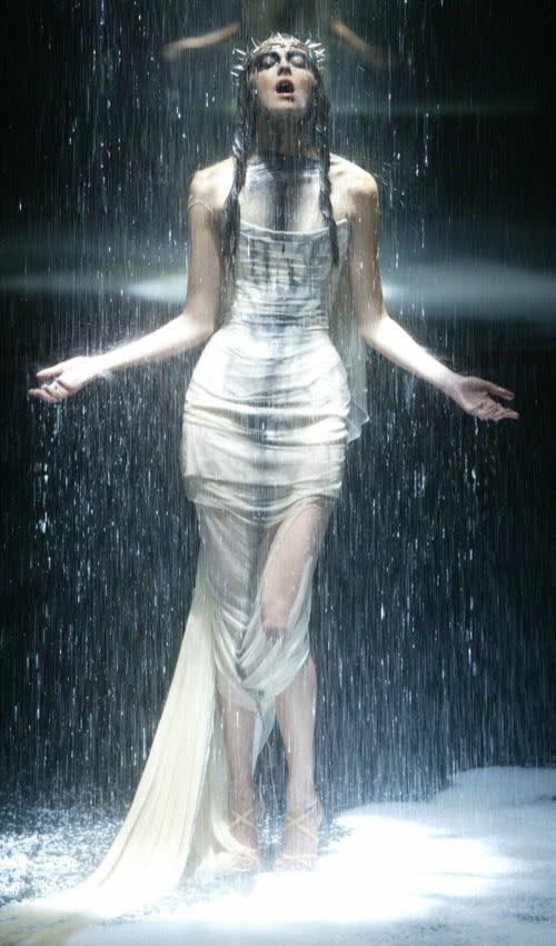 Alexander McQueen was an imaginative showman and his runway presentations were often moody and theatrical, like this one, part of a 2004 charity show in London.