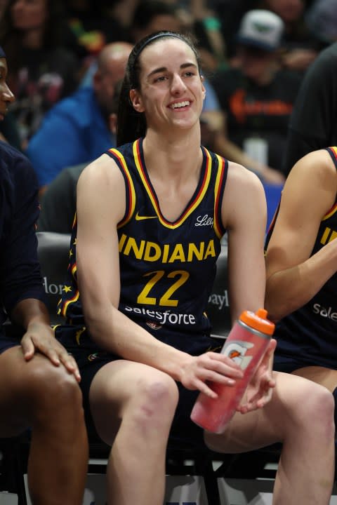 ARLINGTON, TEXAS – MAY 03: Caitlin Clark #22 of the Indiana Fever looks on prior to playing the Dallas Wings in a pre season game at College Park Center on May 03, 2024 in Arlington, Texas. (Photo by Gregory Shamus/Getty Images)