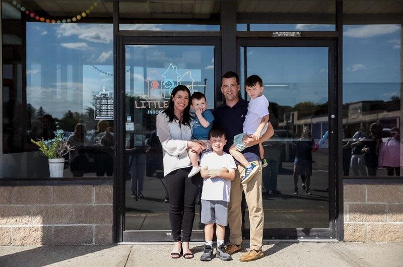 Jackie Perkins, a pediatric occupational therapist, with her family outside The Little Lounge in Horseheads. Perkins recently opened the facility, which also includes a cafe for adults.