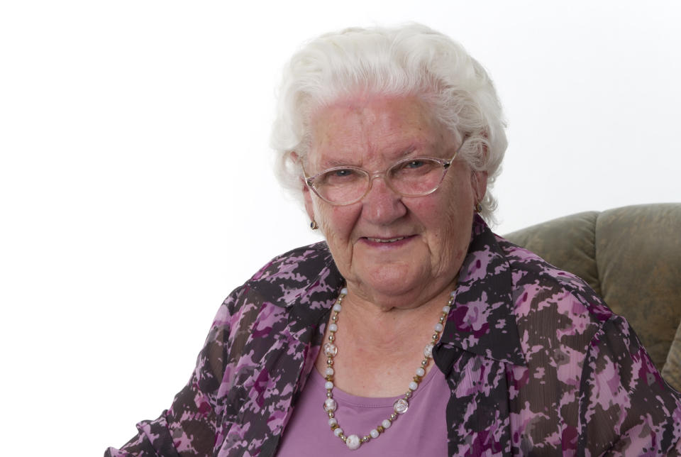 An older woman smiling