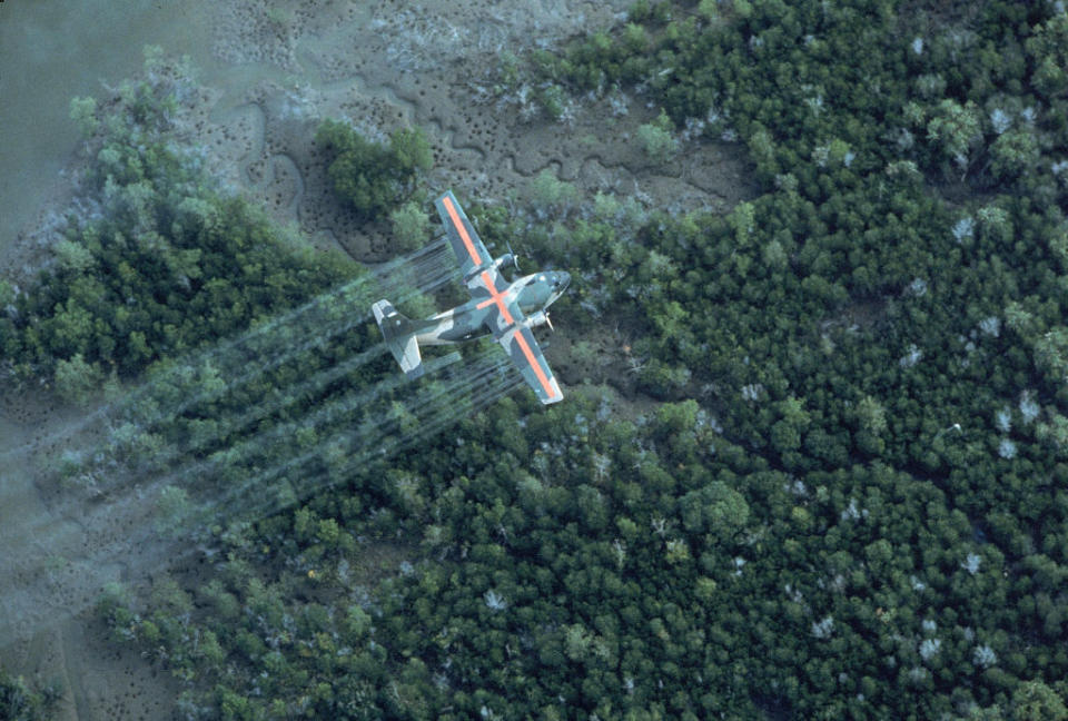 USAF UC 123K plane spraying delta area Agent Orange, in Vietnam war defensive measure. 1970. <span class="copyright">Dick Swanson—Getty Images</span>