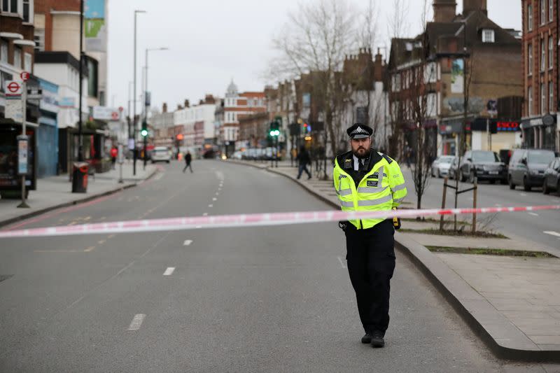 Police is seen near a site where a man was shot by armed officers in Streatham