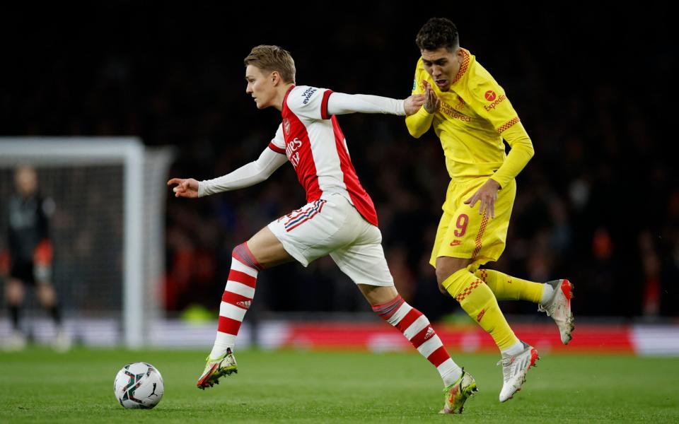 Firmino cops an Odegaard hand in the face - Action Images via Reuters/John Sibley