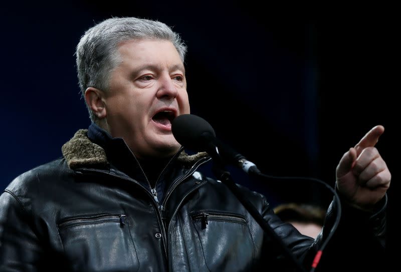 Ukraine's former President Petro Poroshenko takes part in a rally ahead of the so-called "Normandy" format summit, in Kiev