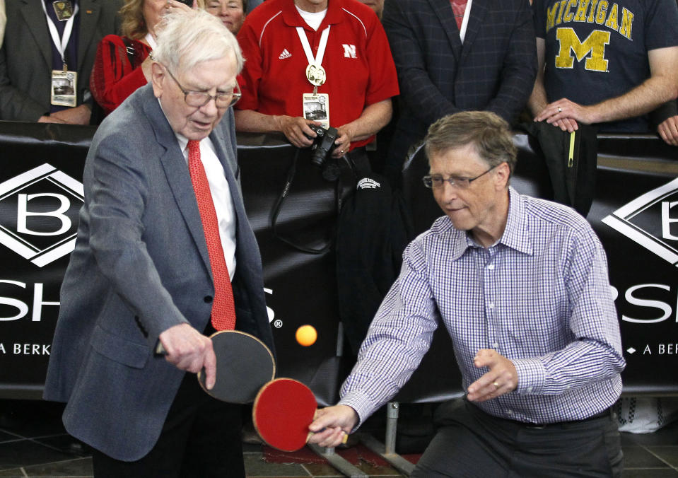 Berkshire Hathaway CEO Warren Buffett (L) plays table tennis with Microsoft Chairman Bill Gates in Omaha May 5, 2013 the day after the company's annual meeting. Buffett at the meeting on Saturday gave the most extensive comments to date about the future of Berkshire Hathaway Inc after he is gone, saying he still expects the conglomerate to be a partner of choice for distressed companies.  REUTERS/Rick Wilking (UNITED STATES - Tags: BUSINESS)