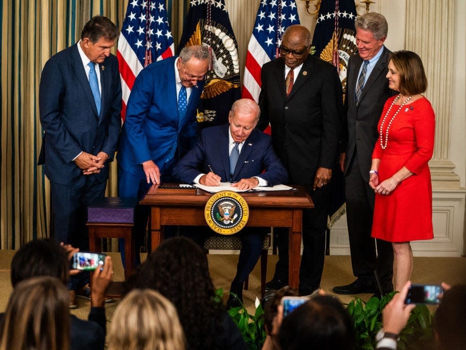 President Joe Biden signs the Inflation Reduction Act into law at the White House on August 16, 2022.