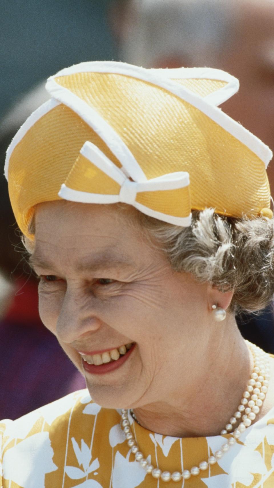 A yellow and white structured hat, 1991