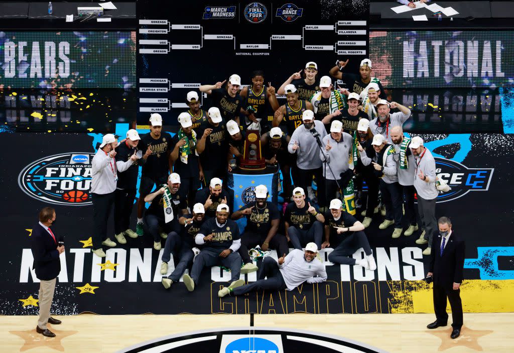 The Baylor Bears pose with the National Championship trophy after beating Gonzaga on April 05, 2021 in Indianapolis.