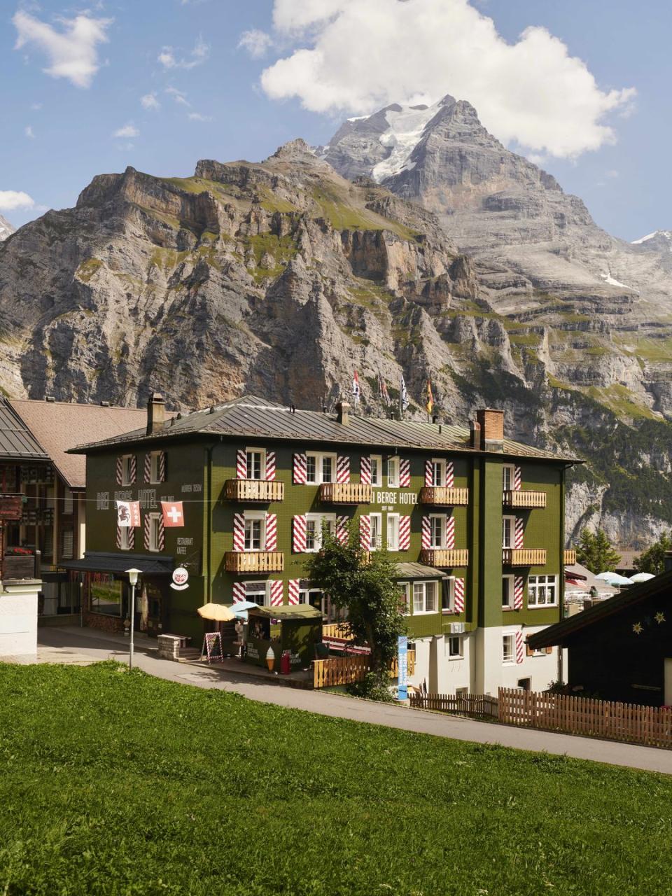 a building with a mountain in the background