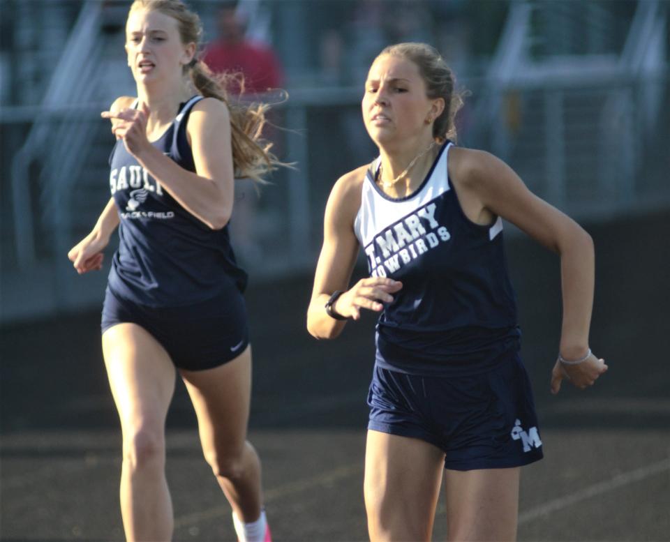 Emma McKinley participates in the 400-meter run during the Northern Michigan Meet of Champions on Tuesday, May 30 in Gaylord, Mich.