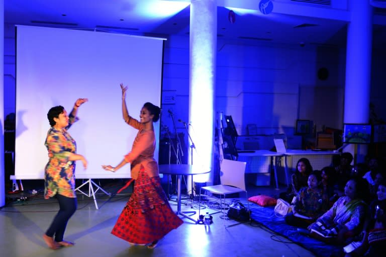 Bangladeshi artists perform during the inauguration ceremony in Dhaka of the country's first lesbian comic character "Dhee" on September 5, 2015, part of a campaign to raise awareness of the plight of gays in the conservative Muslim-majority nation