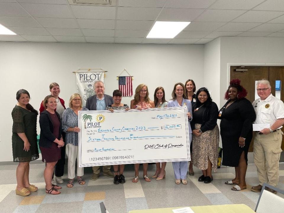 The Pilot Club of Pensacola recently celebrated a successful year of volunteerism and fundraising by giving away $16,000 to 11 different Pensacola non-profits.