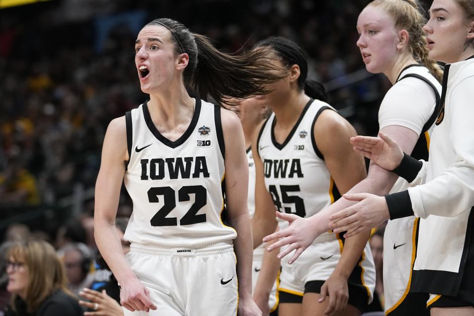 Iowa's Caitlin Clark yells during the first half of the NCAA Women's Final Four championship basketball game against LSUSunday, April 2, 2023, in Dallas. (AP Photo/Tony Gutierrez)