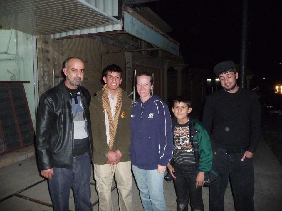 A December 2009 picture of U.S. Army Col. Mary Prophit, center, with Ravand Al Dosaki, second from left, and Dosaki's dad and two of his brothers