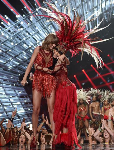 <p>John Shearer/Getty </p> Taylor Swift and Nicki Minaj perform during the 2015 MTV Video Music Awards