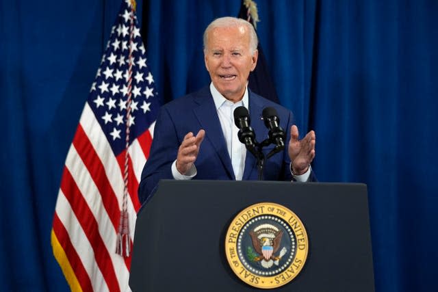 US president Joe Biden speaks at a lectern