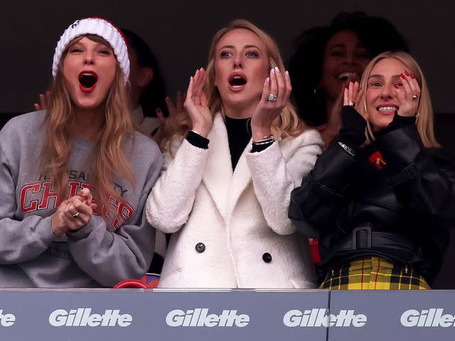 <p>Maddie Meyer/Getty</p> Taylor Swift, Brittany Mahomes, and Ashley Avignone cheer after a Kansas City Chiefs touchdown during the second quarter against the New England Patriots on December 17, 2023.