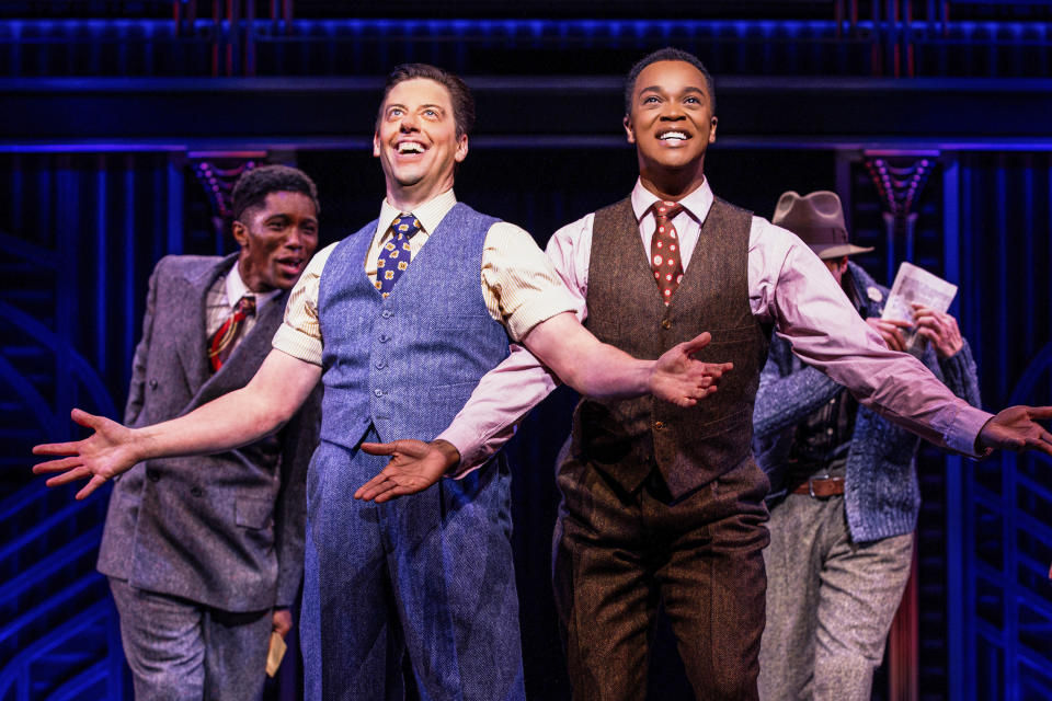 This image released by Polk & Co. shows Christian Borle, foreground left, and J. Harrison Ghee, right, during a performance of the musical "Some Like It Hot." (Marc J. Franklin/Polk & Co. via AP)