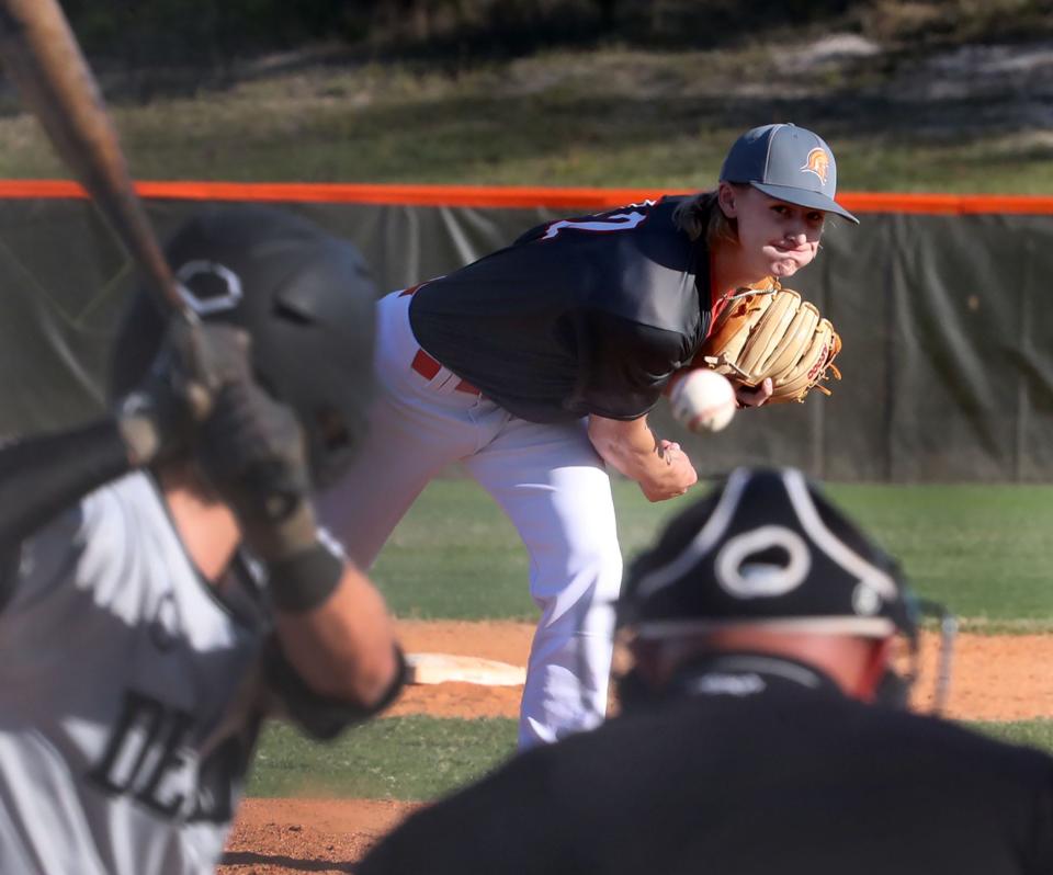 Unviersity High pitcher Bryson Maynard throws to a DeLand High batter, Tuesday March 12, 2024.