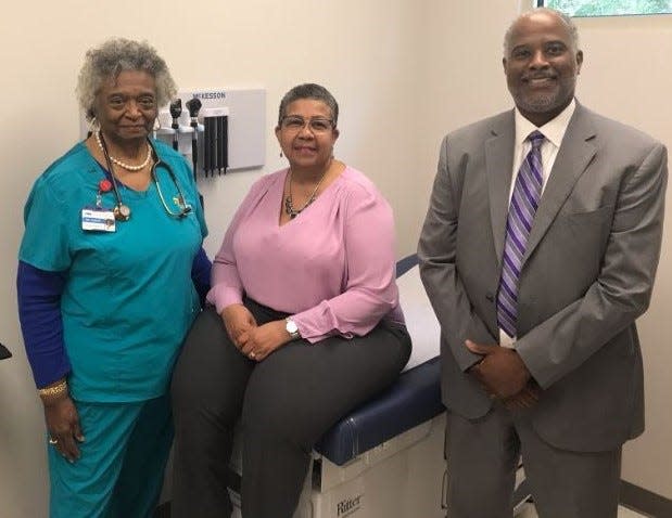 Dr. Gail Hurley, site manager Carol Stephens, and CEO Marcus Garner in one of the new medical treatment offices at the Athens Neighborhood Health Center.