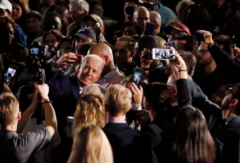 Democratic U.S. presidential candidate and former Vice President Joe Biden takes selfies with supporters after speaking at his South Carolina primary night rally in Columbia, South Carolina, U.S.