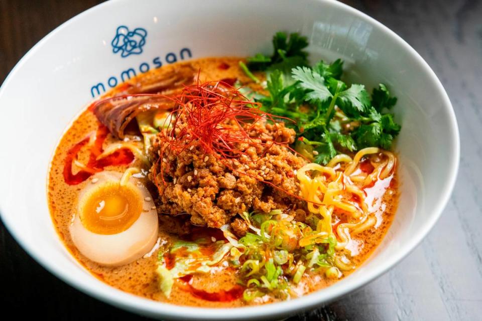 Noodles, like this tan-tan ramen, are the feature at Momosan, Iron Chef Morimoto’s new Wynwood restaurant.