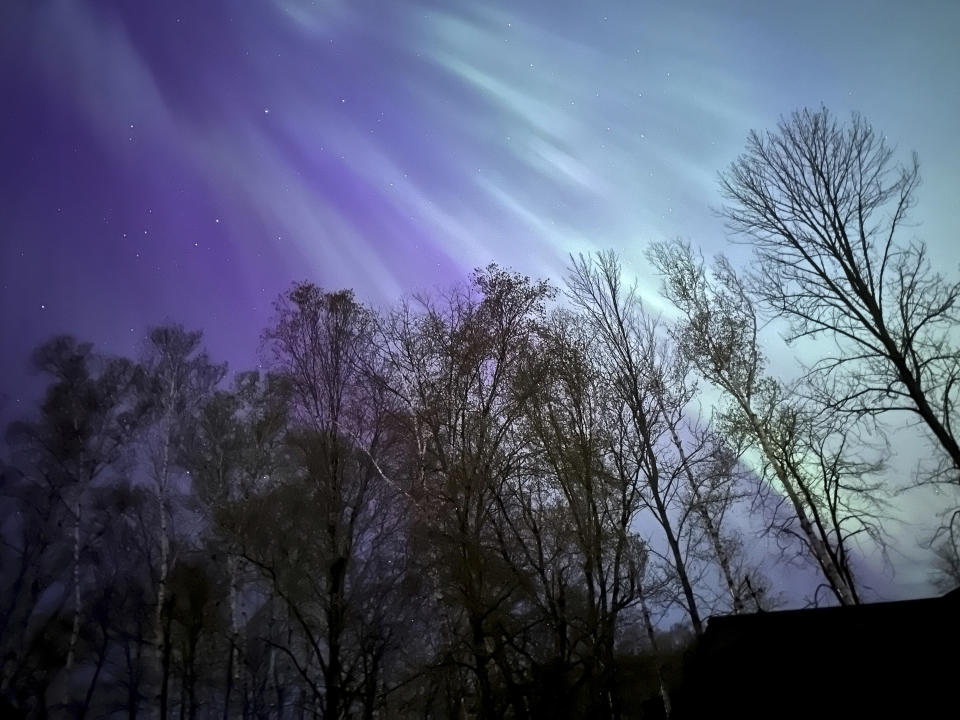 Aurora Borealis or the Northern Lights are seen in Fredericton, Saturday, May. 11, 2024. (Hina Alam /The Canadian Press via AP)