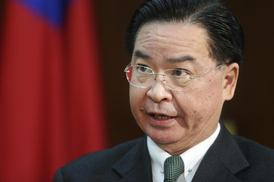 Taiwanese Foreign Minister Joseph Wu speaks during an exclusive interview with The Associated Press at his ministry in Taipei, Taiwan, Tuesday, Dec. 10, 2019. Wu was careful to say his government has no desire to intervene in Hong Kong’s internal affairs, and that existing legislation is sufficient to deal with a relatively small number of Hong Kong students or others who seek to reside in Taiwan. (AP Photo/Chiang Ying-ying)