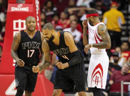 Apr 7, 2016; Houston, TX, USA; Phoenix Suns center Tyson Chandler (4) reacts after a play during the third quarter against the Houston Rockets at Toyota Center. Mandatory Credit: Troy Taormina-USA TODAY Sports