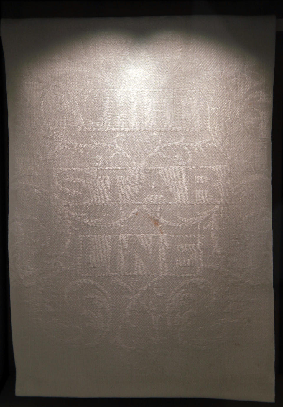 A White Star Line napkin is exhibited at the SeaCity Museum's Titanic exhibition on April 3, 2012 in Southampton, England. The new SeaCity Museum, which will open at 1.30pm on April 10, 100 years to the day since the Titanic set sail from the city. The museum, which cost 15 GBP million, promises to tell the largely untold story of Southampton's Titanic crew and the impact the tragedy had on the city, as well as featuring other aspects of the city's seafaring past. (Photo by Matt Cardy/Getty Images)