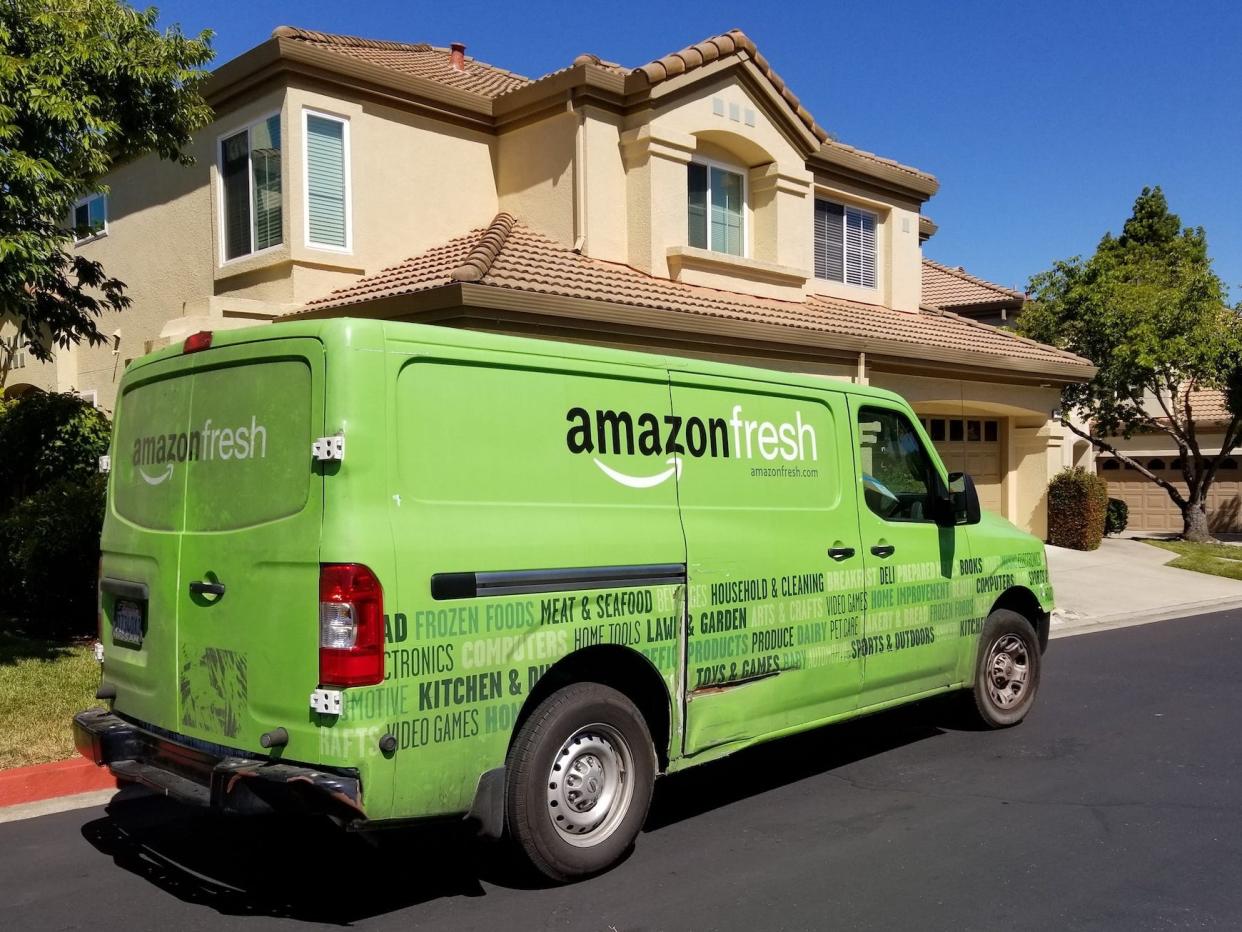 Amazon Fresh grocery delivery truck from the Amazon Prime service parked on a suburban street in San Ramon, California, July 5, 2018.