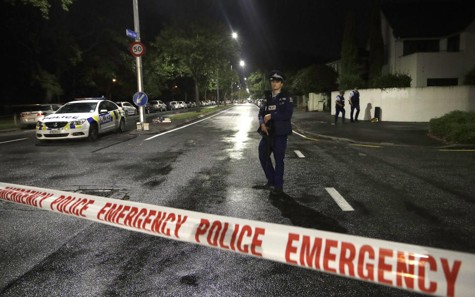 A police officer patrols at a cordon near a mosque in central Christchurch, New Zealand, Friday, March 15, 2019. Multiple people were killed in mass shootings at two mosques full of worshippers attending Friday prayers on what the prime minister called "one of New Zealand's darkest days," as authorities detained four people and defused explosive devices in what appeared to be a carefully planned attack.