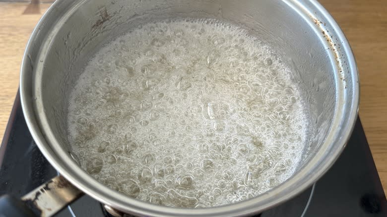 Sugar syrup simmering in pot