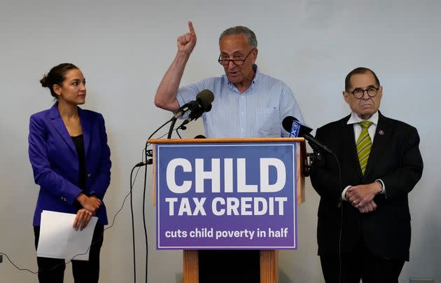 Democratic Reps. Alexandria Ocasio-Cortez and Jerry Nadler of New York listen as Majority Leader Chuck Schumer speaks about the expanded Child Tax Credit during a press conference on July 8. (Photo: TIMOTHY A. CLARY via Getty Images)