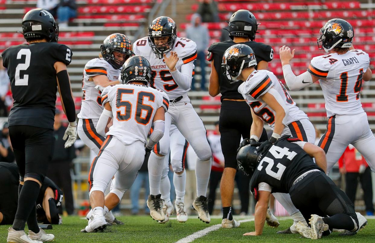 Stratford's Laurenz Plattner (79) celebrates after making a 32-yard field goal as time expires against Darlington High School in the WIAA Division 6 state championship game on Nov. 16, 2023, at Camp Randall Stadium. Stratford won the game, 10-7.