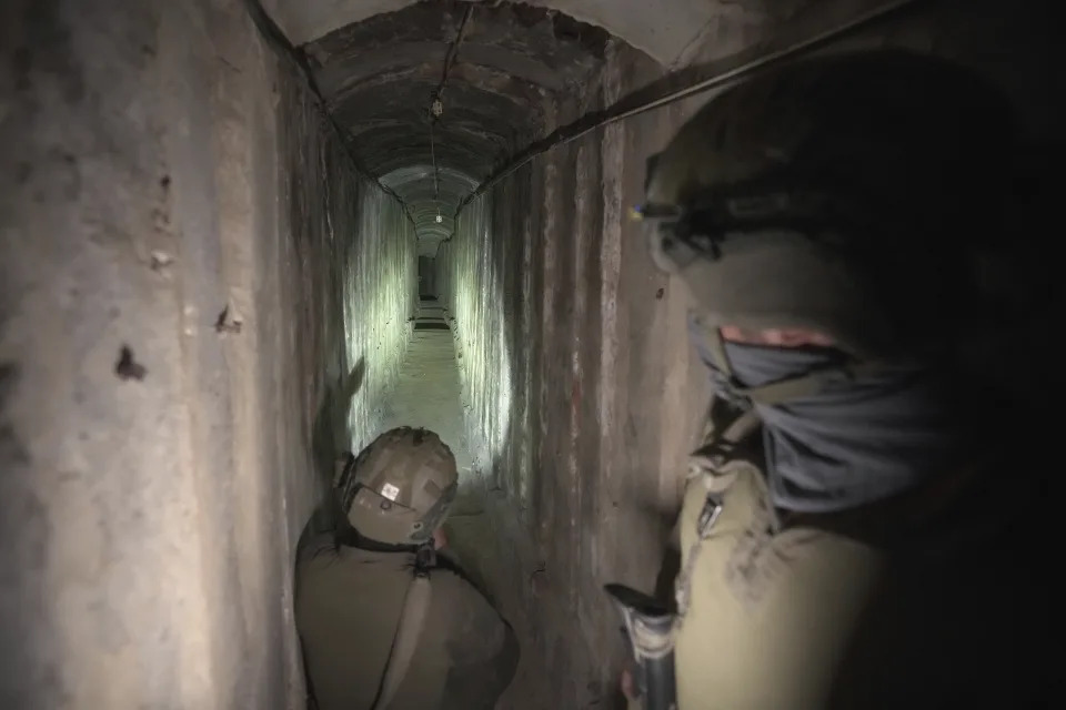 Israeli soldiers show the media an underground tunnel found underneath Shifa Hospital in Gaza City, Wednesday, Nov. 22, 2023. Israel says that Hamas militants sought cover on the grounds of the hospital and used the tunnel for military purposes. (AP Photo/Victor R. Caivano)