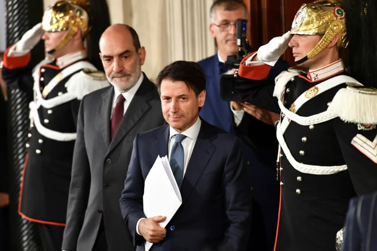 Italy's prospective new prime minister Giuseppe Conte laboured to finalise his government team as a battle heated up over the populist coalition's eurosceptic pick for economy minister